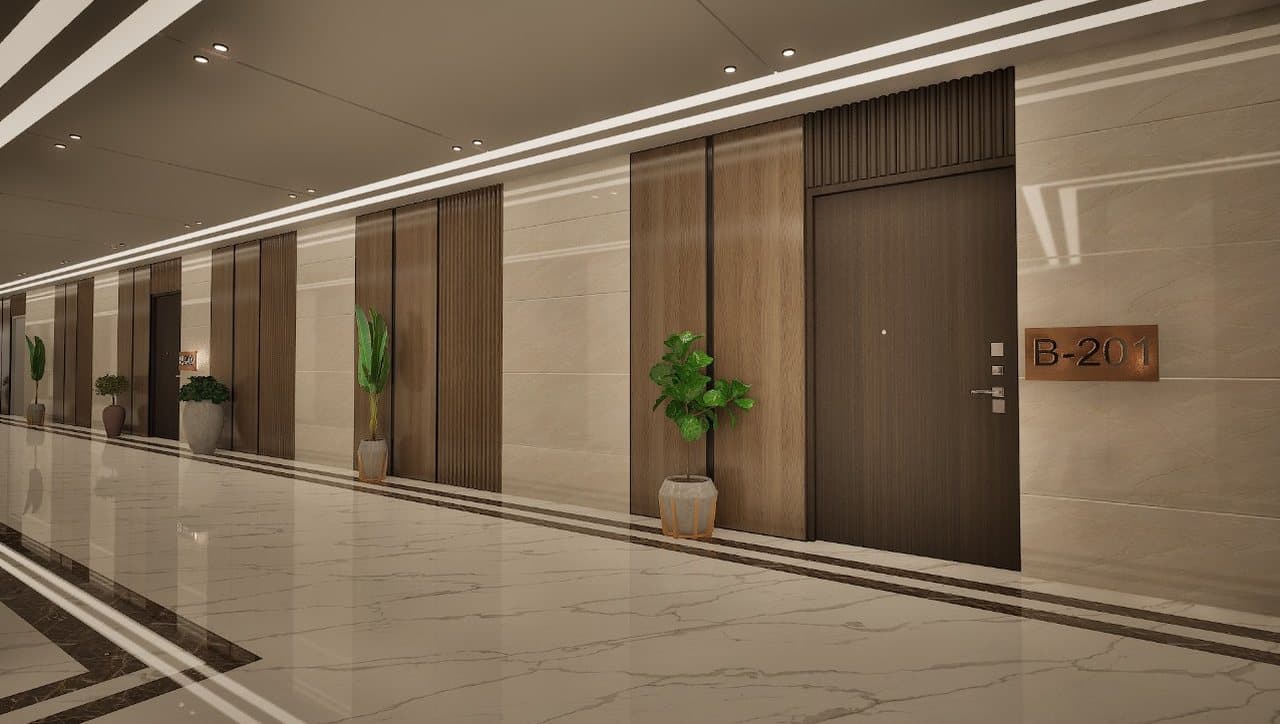 Long corridor at SBS Tower with linear ceiling lighting and polished floors