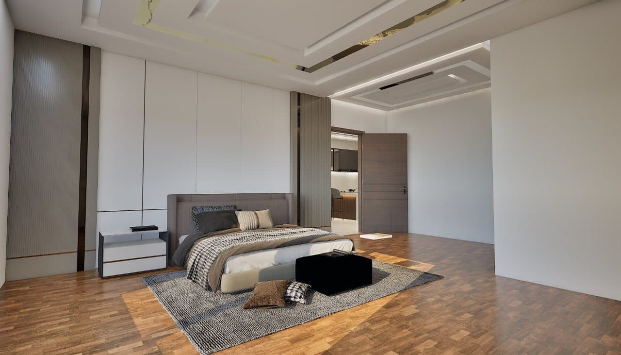 Master bedroom at SBS Tower with fitted wardrobes and timber flooring